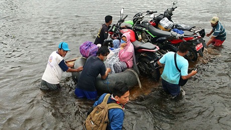 Magazine article aboutClaims-for-Jakarta-floods-are-well-underway 